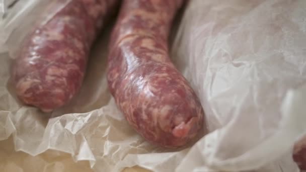 Flavorful Raw Italian Sausages Cajun Flavored Pork Sausages White Paper — Stock Video