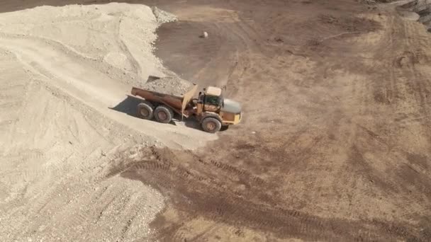 Bird Eye View Full Dump Truck Traveling Construction Site — Stock Video