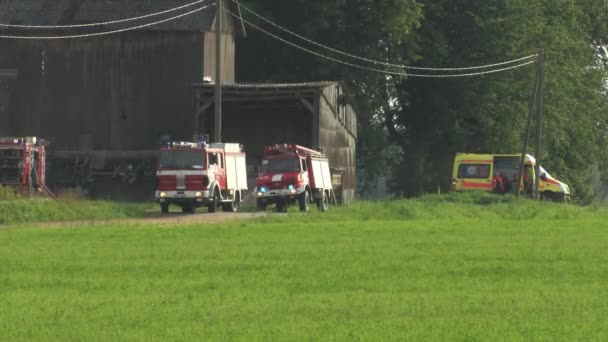 Fireman Extinguish Fire Hose Firefighters Put Out Burning Grain Forge — Stock Video