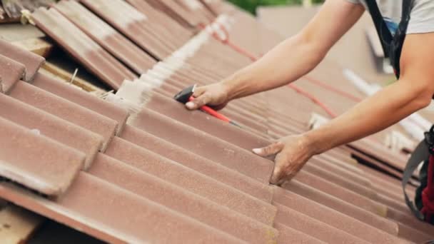 Worker Fitting Tiles Roof Working Barehanded — Stock Video