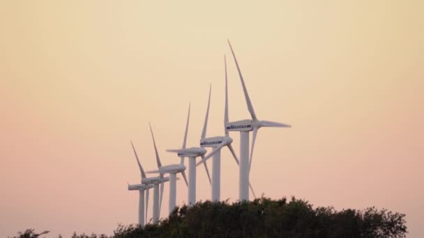 Vestas Wind Turbines Spinning Sunset Producing Clean Energy Wide Slow — Stock Video