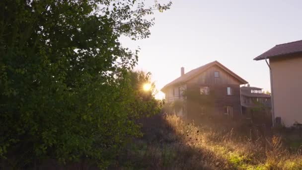 Sieben Linden Eco Village Community Early Morning Sunshine Dolly Right — Stock Video