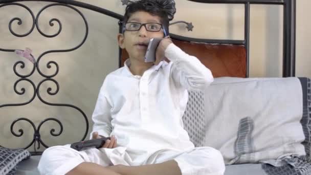 Cute Little Boy Child Funny Mocking Making Faces Talking Phone — Stock Video