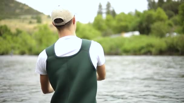 Slow Motion Shot Caucasian Male Fisherman Casting His Hook While — Stock Video