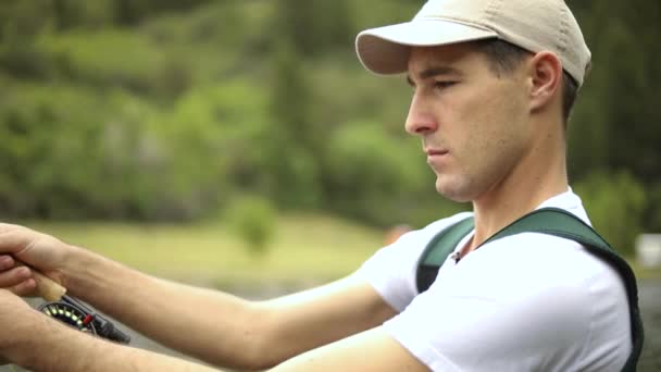 Slow Motion Shot Caucasian Male Fisherman Casting His Hook While — Vídeos de Stock