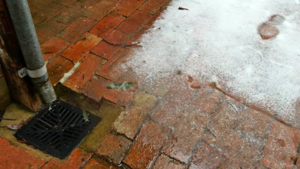 Water Flows Downpipe Drain Brick Path Snow — Stock Video