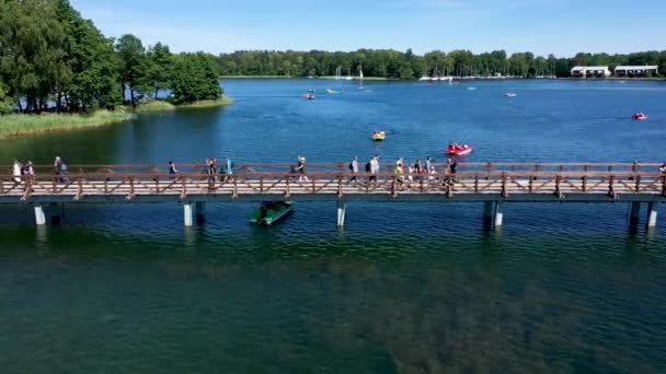 Aerial Slow Panning Shot People Walking Wooden Trakai Island Bridge — Stock Video