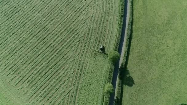 Aerial Tractor Working Field Alongside Rural English Country Road — Stock Video