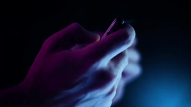 Thumb Scrolling Smartphone Landscape Close Dark Room Side Profile Purple — Stok Video