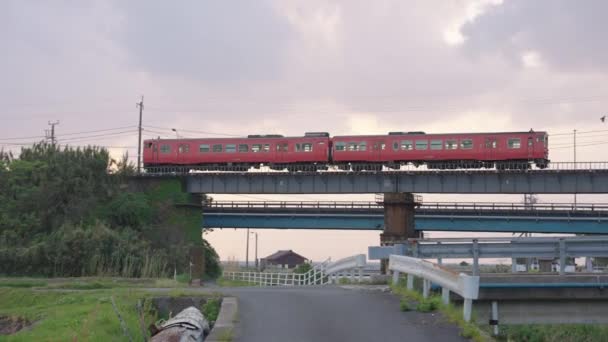 Red Countryside Local Train Crossing Bridge Mikuriya Tottori Japan — Stock Video