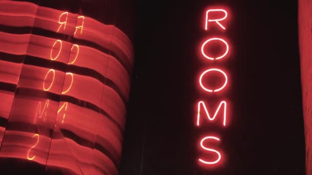Red Neon Signs Spelling Rooms Abstract Reflection Words — Stock Video