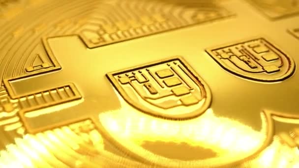 Rotating Golden Physical Bitcoin Close Shot — Stock Video