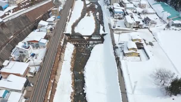 Yamanouchi Onsen Town Vista Aérea Inclinação Revelando Paisagem Nevada Japão — Vídeo de Stock