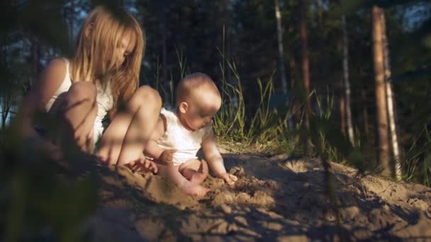 Siblings Playing Older Sister Baby Child Enjoying Games Sand Slomo — Stock Video