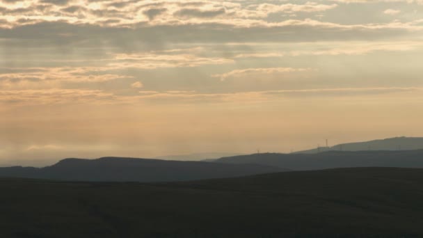 Sunrise Light Rays Shining Wind Turbine Farm Landscape Layers Rolling — Αρχείο Βίντεο