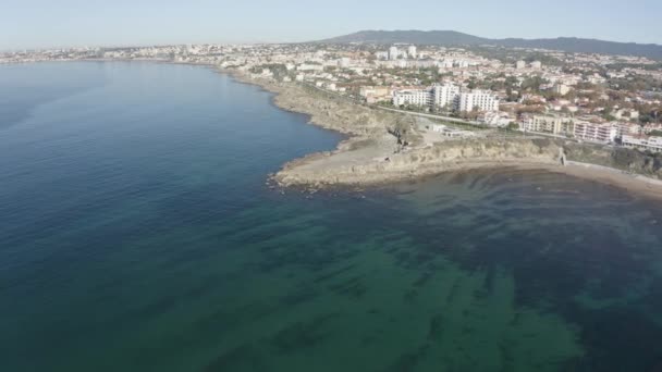มมองโดรนทางอากาศของชายหาด Estoril Praia Bico Pedro Estoril Greater Lisbon Cascais ในพ — วีดีโอสต็อก