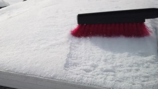 Someone Brushing Snow Solar Panel Half Speed — Stock Video