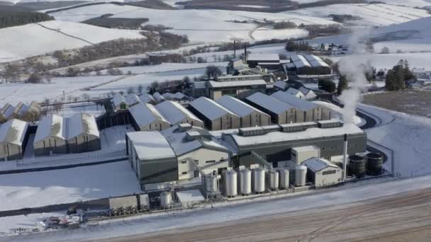 Aerial View Glenlivet Whisky Distillery Surrounded Snow Late Afternoon Sun — Stock Video