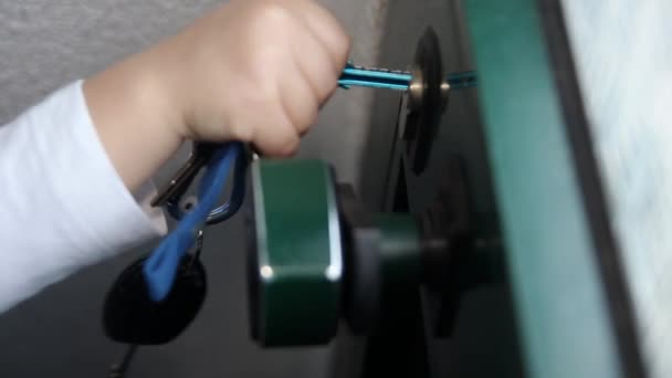 Young Child Trying Unlock Open Door Key Hand Twisting Turning — Stock Video