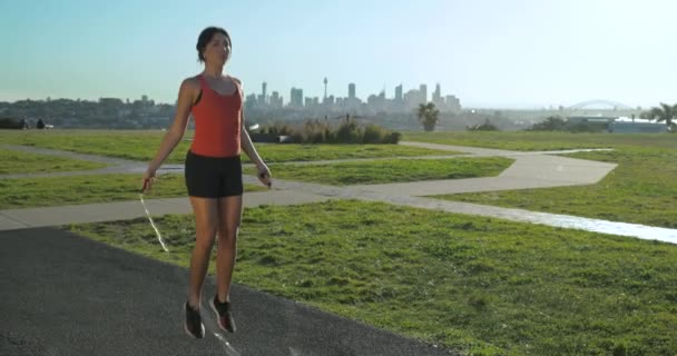 Wide Shot Eurasian Female Skipping Park — Stock Video