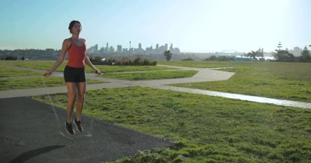 Wide Shot Eurasian Female Exercise Skipping Park Sydney Harbour — Stock Video