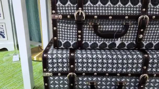 Two Black White Vintage Checked Suitcases Sit Stacked One Another — Stock Video