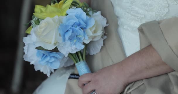 Bride Dressed Wedding Holding Bouquet White Blue Yellow Flowers While — Stock Video