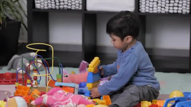Two Years Old Mexican Baby Boy Focused Playing Didactic Toys — Stock Video