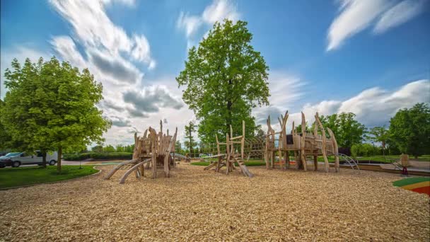 Static Shot Kids Playing Playground Side Parking Lot Daytime Timelapse — Stock Video