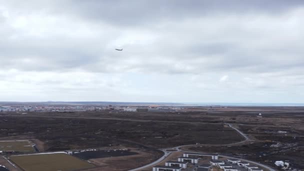 Distant Airplane Taking Keflavk Airport Cloudy Day Aerial — Stock Video