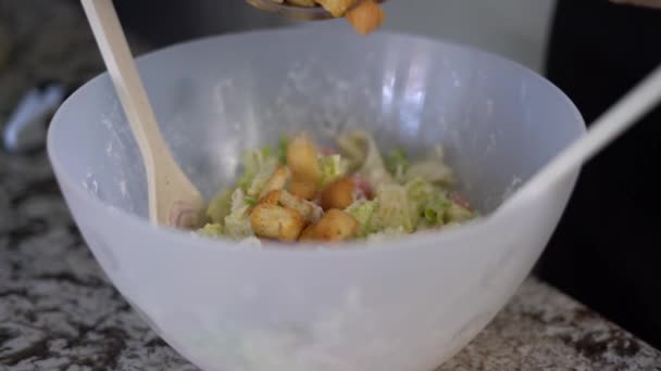 Adding Crunchy Croutons Large Bowl Caesar Salad Close Selective Focus — Stock Video