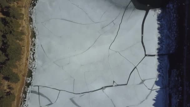 Aerial Top View Cracked Frozen Lake Due Global Warming — Stock Video