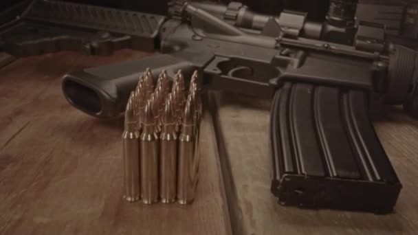 High Angle Dolly Loaded Assault Rifle Small Amount Ammunition Foreground — Stock Video