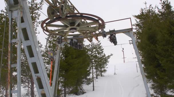 Ski Lift Top Wheel Rotating Lift Bars Moving Steady Shot — Stock Video