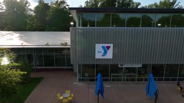 Building Ymca Ywca Facility Rising Aerial Community Center — Stock Video