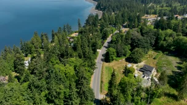 Drone Shot Road Running Parallel Freeland Washington Shoreline — Stock video