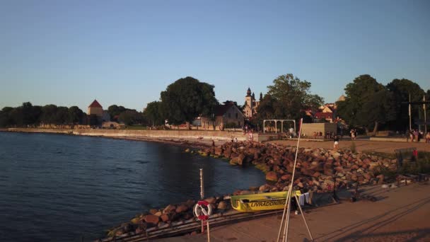 Static Slomo People Walking Water Sunset Visby Gotland — Stock Video