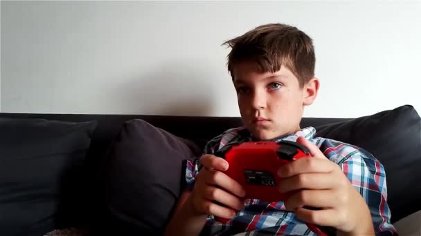 Boy Playing Video Game Nintendo Switch Gaming Console — Stock video