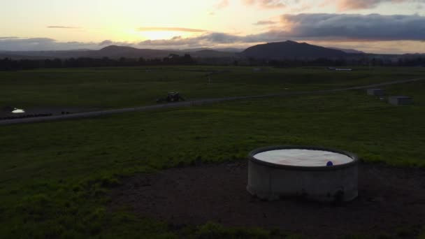 Serene Sunset Open Grass Field Ranch Water Hole Aerial — Stock Video