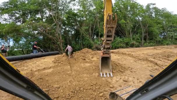 Man Using His Feet Sweep Loose Dirt Bottom Trench Men — Stock Video