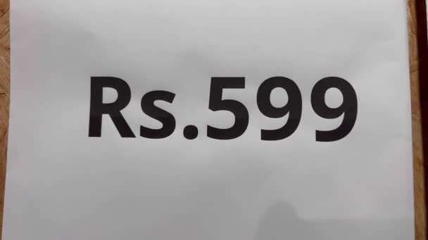 599 Rupees Graphically Represented Paper Sheet — Stock Video