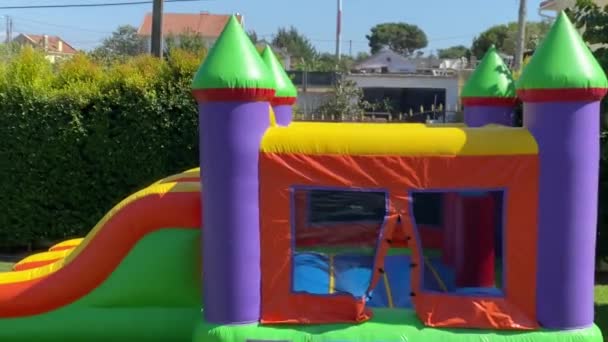 Kids Preparing Jump Colour Big Castle — Stock Video