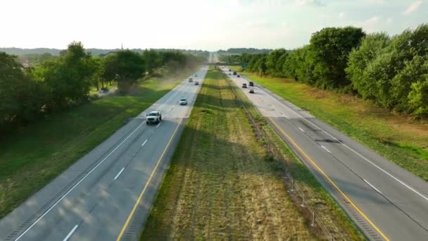 Cars Travel Highway Summer Golden Hour Reverse Aerial Grass Median — Stock Video