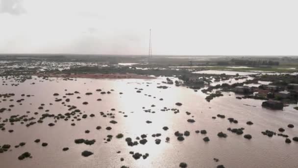 Avión Tripulado Aéreo Avanzando Disparando Sobre Tierras Agrícolas Completamente Sumergidas — Vídeos de Stock