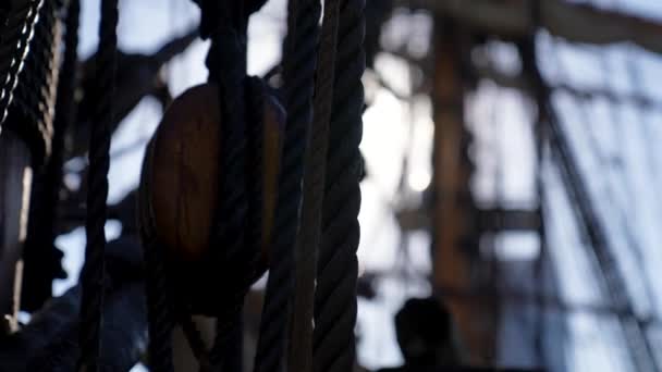 Old Naval Warship Rigging Shallow Depth Field Sun Glare Sea — Stock Video