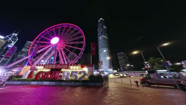 Hong Kong Observation Wheel Освітлювався Вночі Міська Сковорода Часовим Прольотом — стокове відео