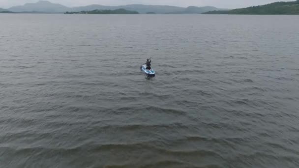 Tracking Shot Young Woman Paddleboarding Loch Lomond — Stock video