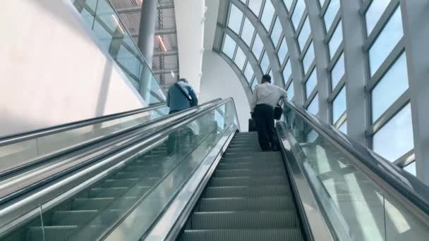 Passengers Escalators Moving Upward Oslo Gardermoen Airport Norway Low Angle — Stock Video