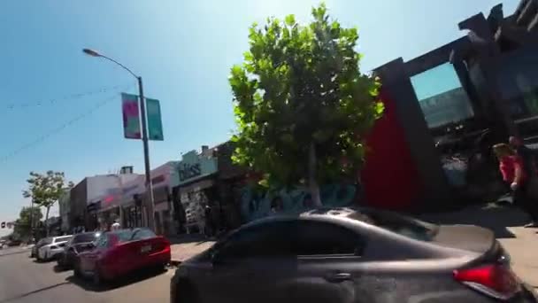 Dirigindo Pela Melrose Avenue Los Angeles Com Lojas Rua — Vídeo de Stock