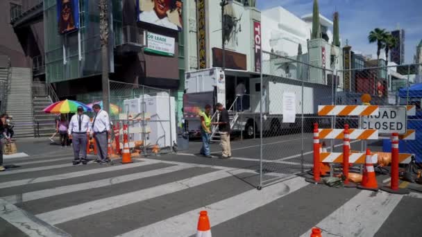 Crews Block Hollywood Boulevard Set Oscars While Tourists Cross Street — Stock Video